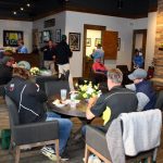 Guests relax in the lounge during Masters hospitality